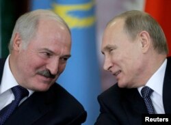 Александр Лукашенко и Владимир Путин в Москве после заседания Совета ЕврАзЭС. 23 декабря 2014 года